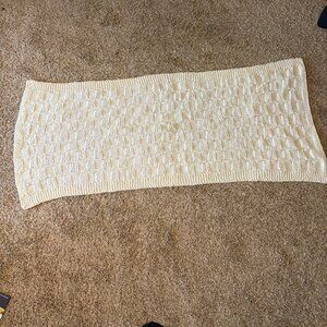 Handmade off white textured knitted gender neutral baby blanket